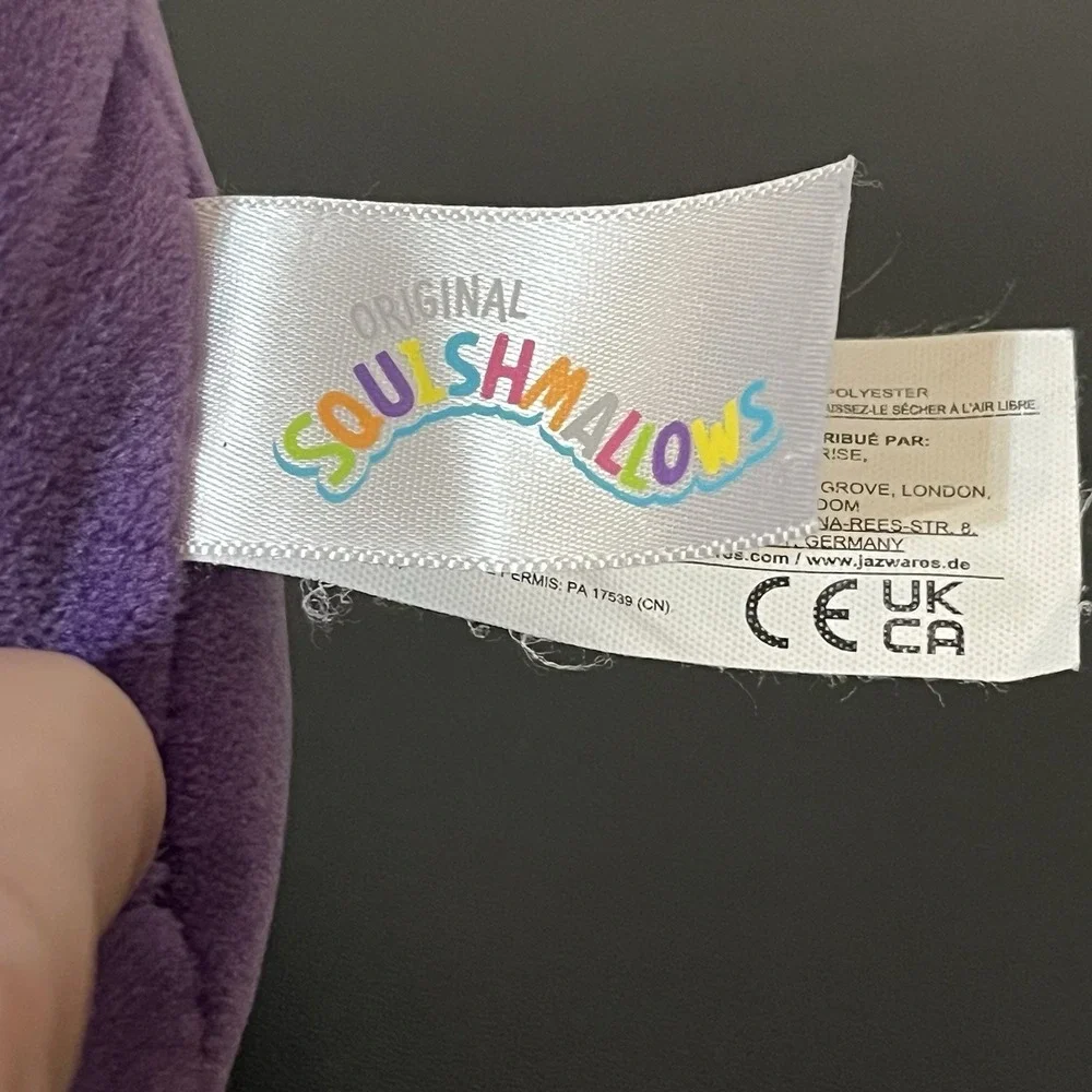 Squishmallows axel purple